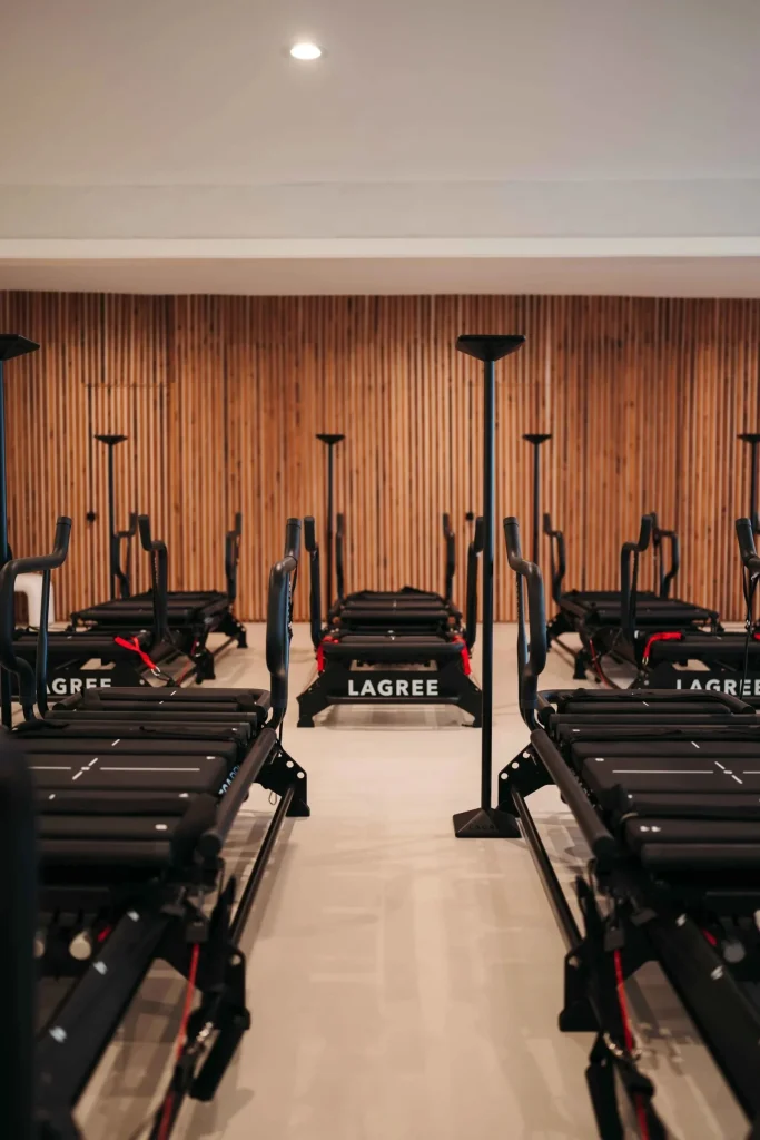 Interior of Reform Room Lagree fitness studio in Fairfield CA with exercise equipment.