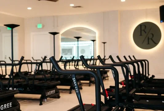 Interior of Reform Room Lagree fitness studio in Fairfield CA with exercise equipment.