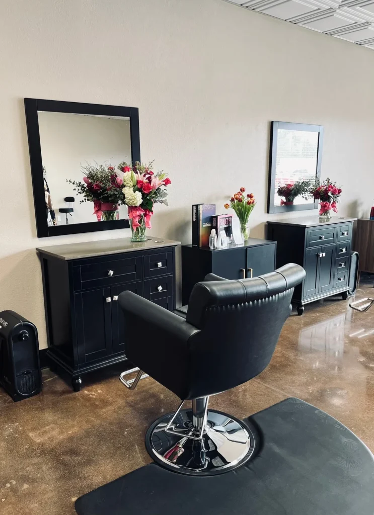 Modern salon interior with styling chairs at Salon Collective GV in Fairfield CA.