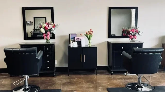 Modern salon interior with styling chairs at Salon Collective GV in Fairfield CA.